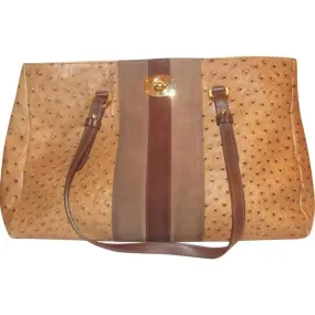 Furla, two handle, tote bag made of a fabulous, brown ostrich embossed leather and suede striped center in shades of burgundy