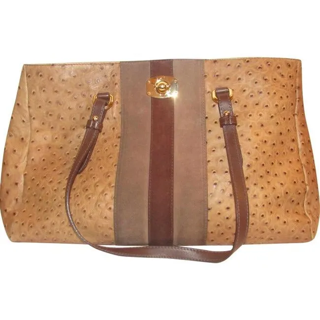 Furla, two handle, tote bag made of a fabulous, brown ostrich embossed leather and suede striped center in shades of burgundy