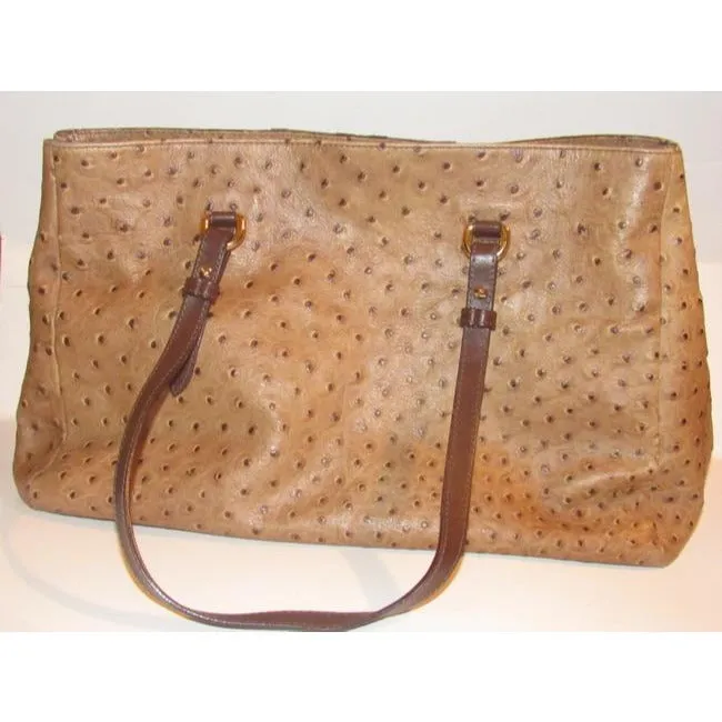 Furla, two handle, tote bag made of a fabulous, brown ostrich embossed leather and suede striped center in shades of burgundy